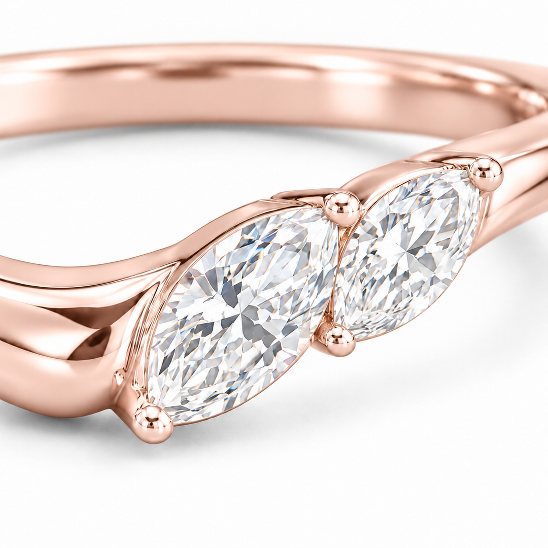 The Sprig marquise diamond contour wedding band in 14K rose gold, close-up detail
