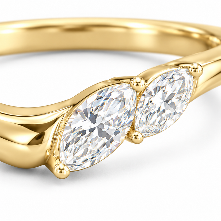 The Sprig marquise diamond contour wedding band in 14K yellow gold, close-up detail