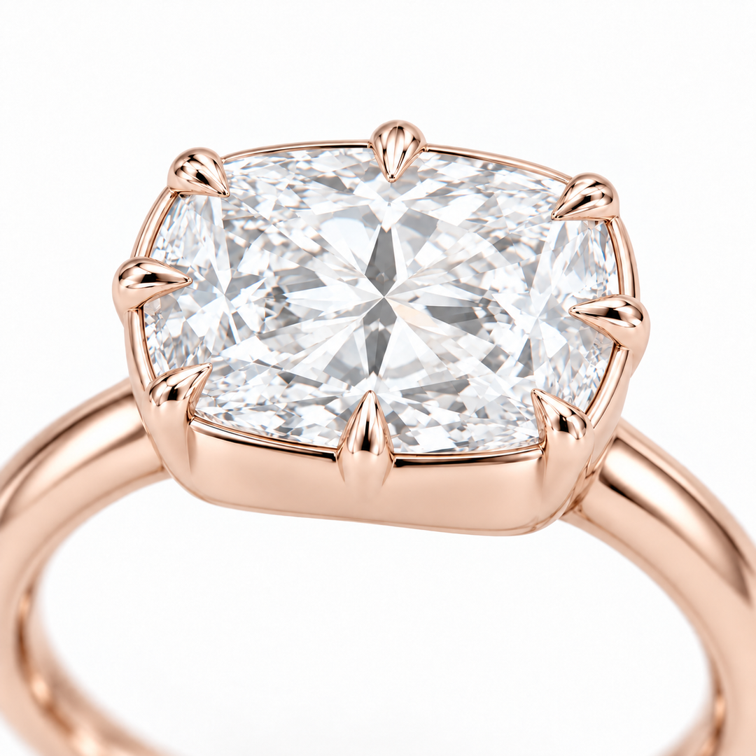 The Camellia east-west cushion lab diamond ring in 14K rose gold, claw detail