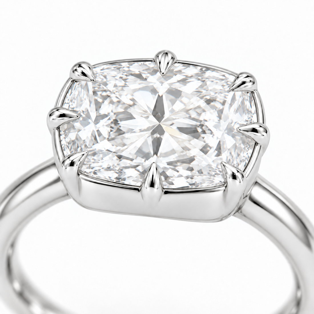 The Camellia east-west cushion lab diamond ring in 14K white gold, claw detail