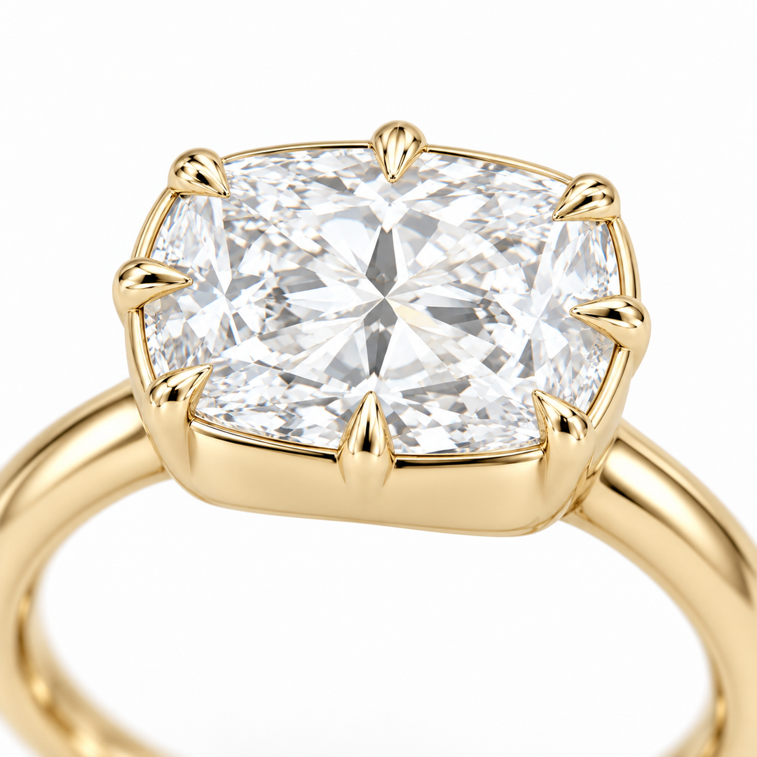 The Camellia east-west cushion lab diamond ring in 14K yellow gold, claw detail