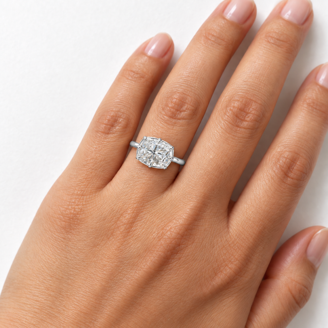 The Camellia east-west cushion lab diamond ring in 14K white gold, on the hand