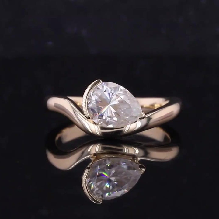 6*8mm Pear Cut with Moissanite Curved Ring in 10K Yellow Gold