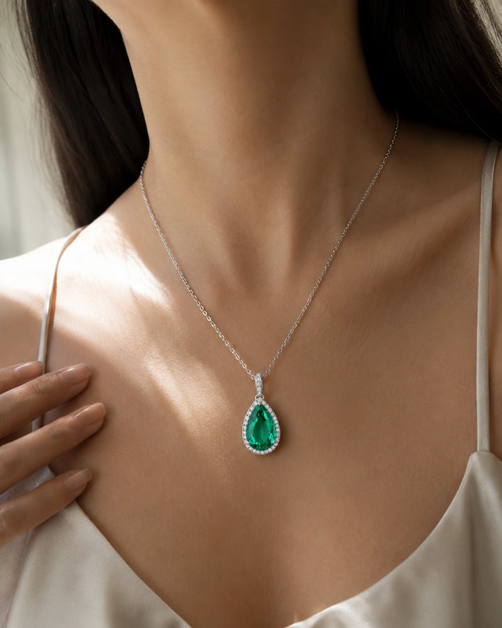 Pear Lab Emerald Halo Pendant worn on model