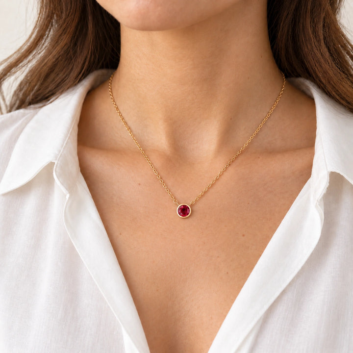 Bezel-Set Round Lab Ruby Pendant worn on model, styling visualization