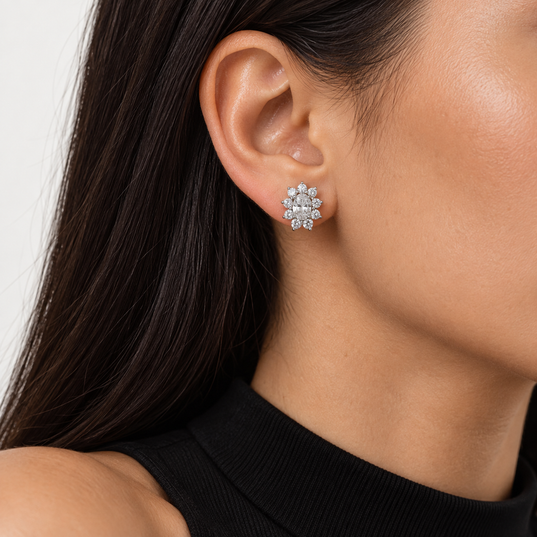 Oval Floral Halo Lab Diamond Stud Earrings worn on the ear