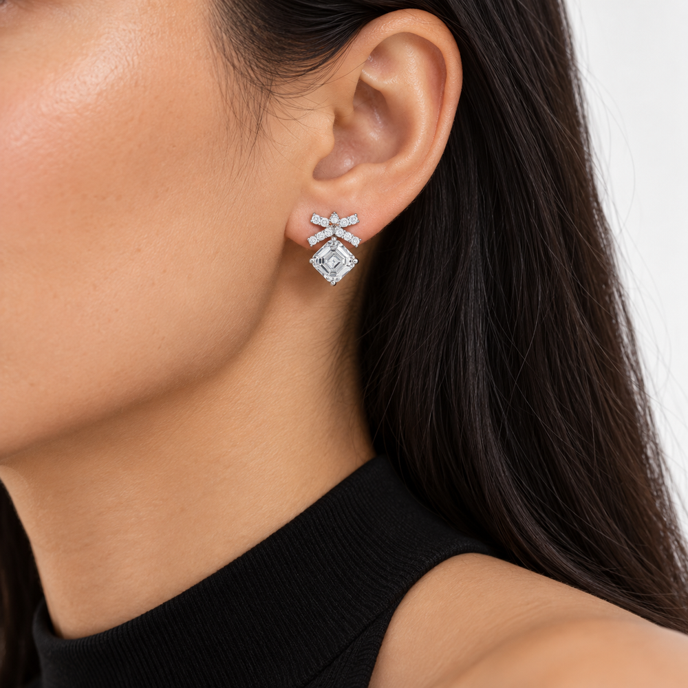 Asscher Bow Lab Diamond Stud Earrings worn on the ear