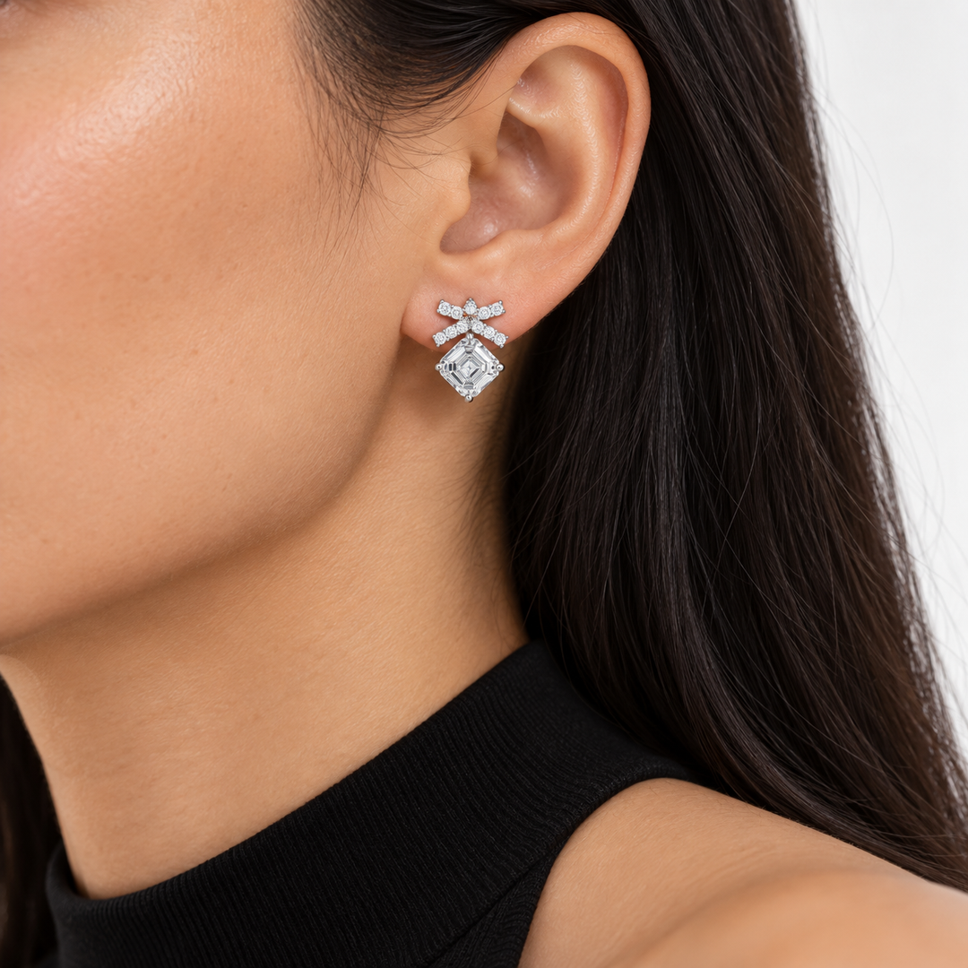 Asscher Bow Lab Diamond Stud Earrings worn on the ear