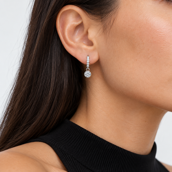 Bezel Drop Lab Diamond Huggie Earrings worn on the ear