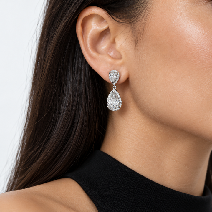 Twin Pear Halo Lab Diamond Drop Earrings worn on the ear