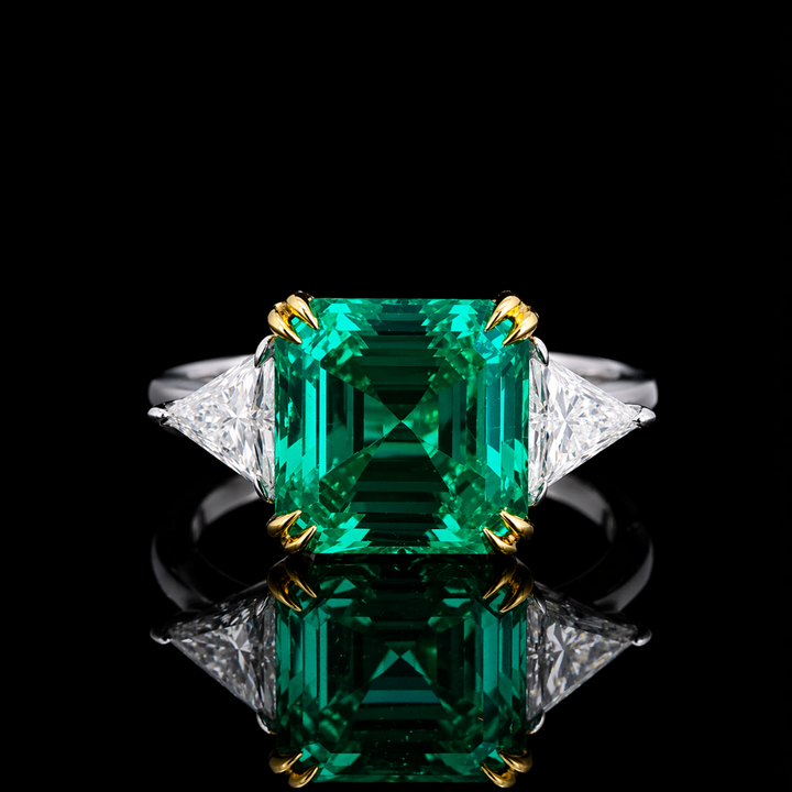 The Facet — Emerald Three-Stone Ring