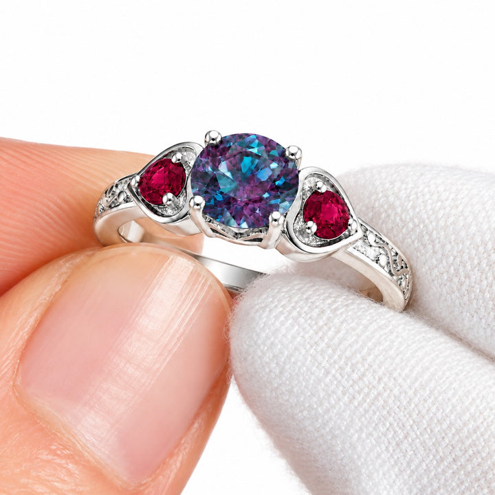 The Roserie — Alexandrite & Ruby Three-Stone Ring in 14K white gold, detail view
