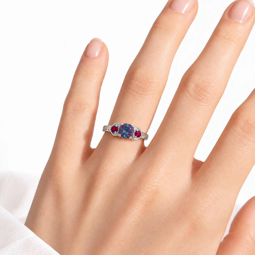The Roserie — Alexandrite & Ruby Three-Stone Ring in 14K white gold, worn on hand