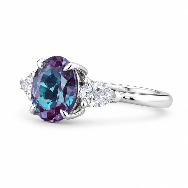 The Virelle — Oval Alexandrite Three-Stone Ring in 14K white gold, angled view