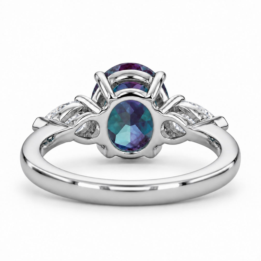 The Virelle — Oval Alexandrite Three-Stone Ring in platinum, back view