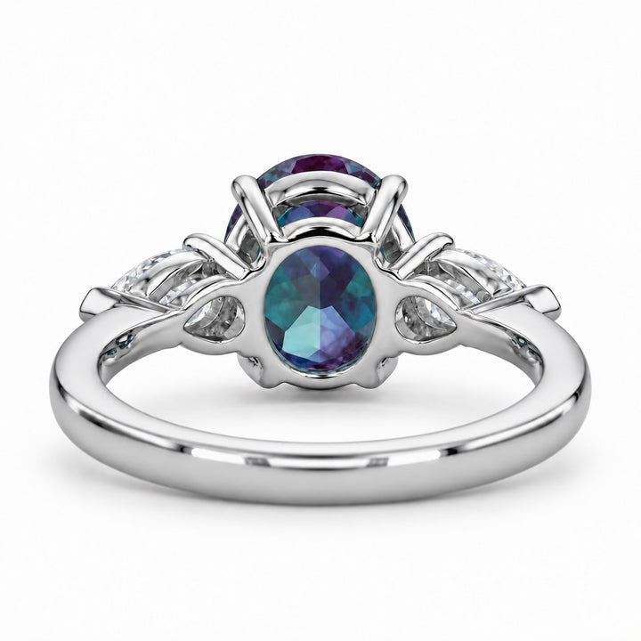 The Virelle — Oval Alexandrite Three-Stone Ring in platinum, back view
