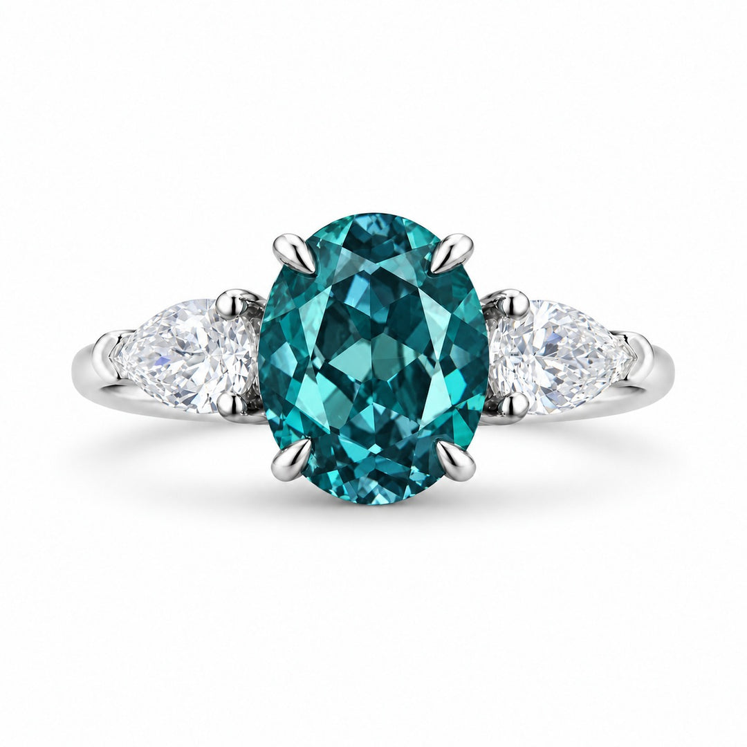 The Virelle — Oval Alexandrite Three-Stone Ring in 14K white gold, in daylight