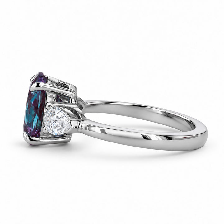 The Virelle — Oval Alexandrite Three-Stone Ring in platinum, side view