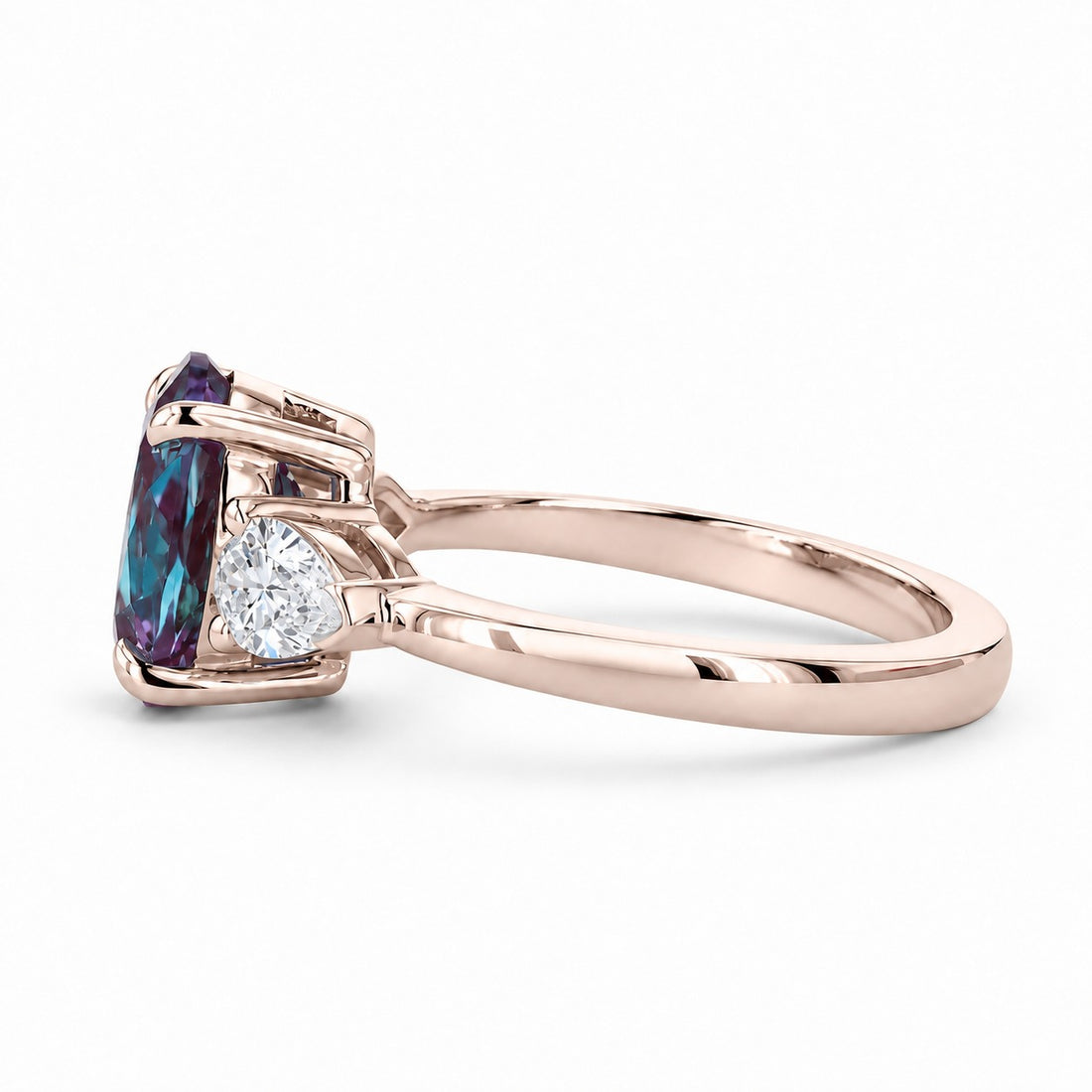 The Virelle — Oval Alexandrite Three-Stone Ring in 14K rose gold, side view