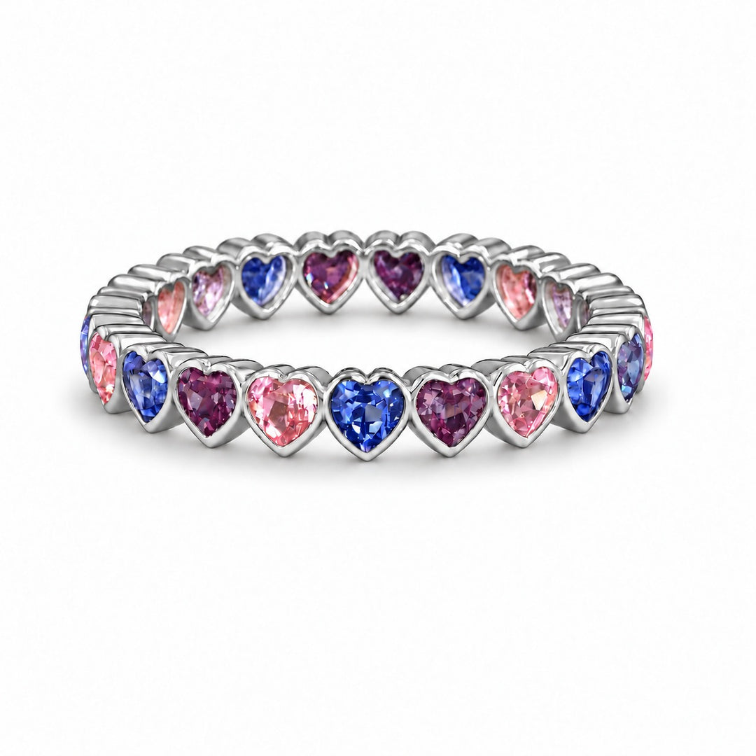 Heart Sapphire & Alexandrite Eternity Band in platinum, in warm light
