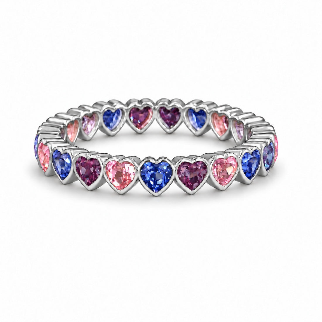 Heart Sapphire & Alexandrite Eternity Band in platinum, in warm light