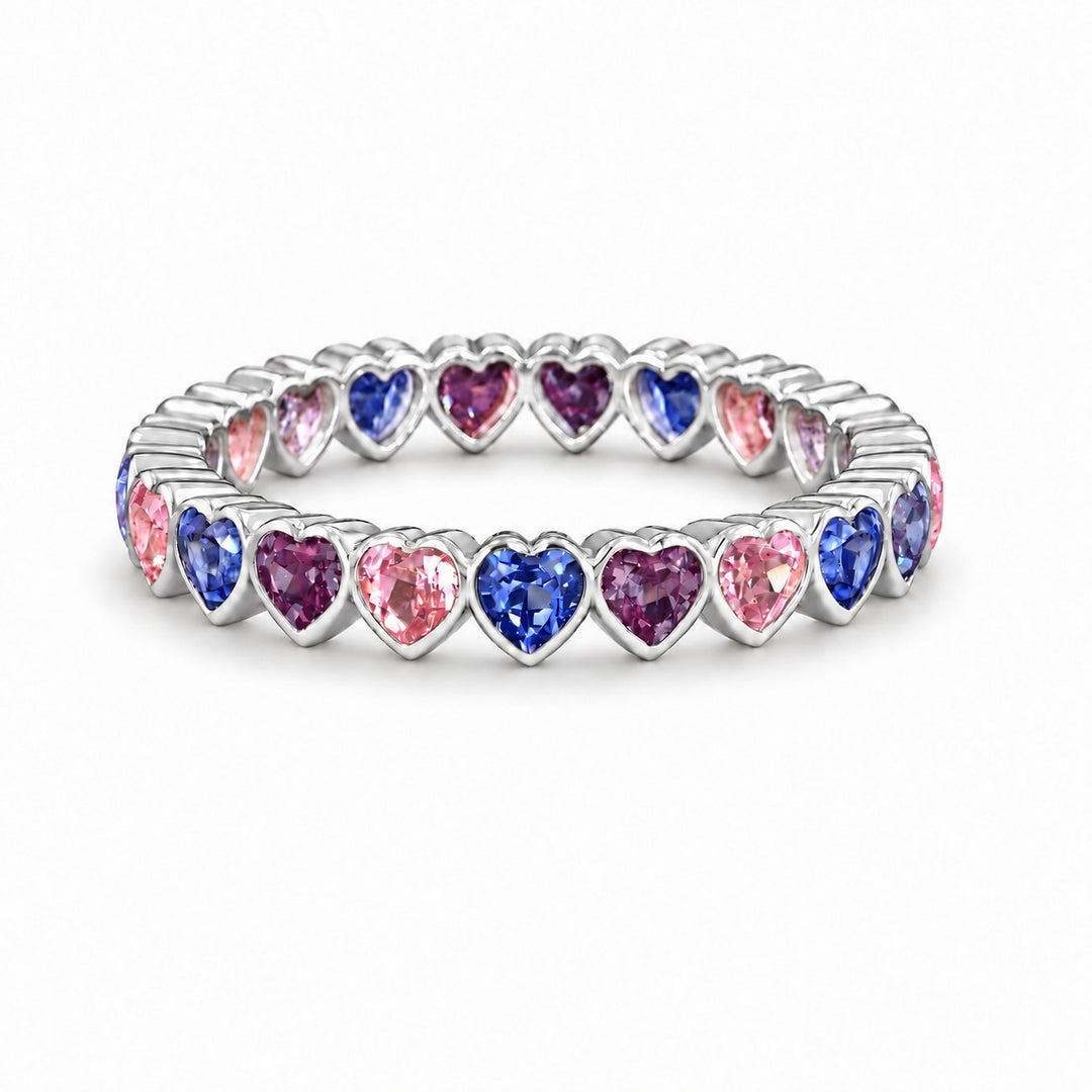 Heart Sapphire & Alexandrite Eternity Band in 14K white gold, in warm light