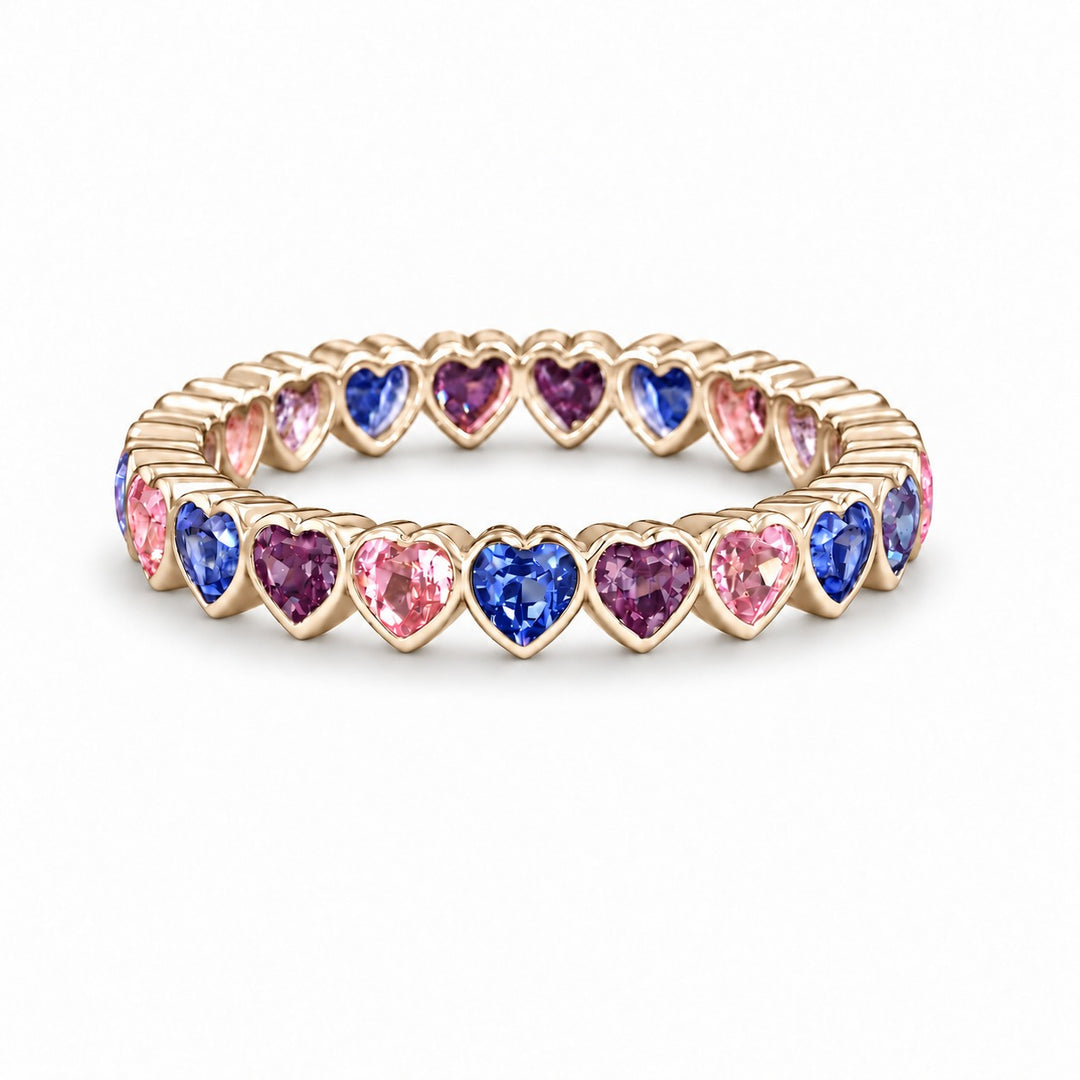 Heart Sapphire & Alexandrite Eternity Band in 14K yellow gold, in warm light