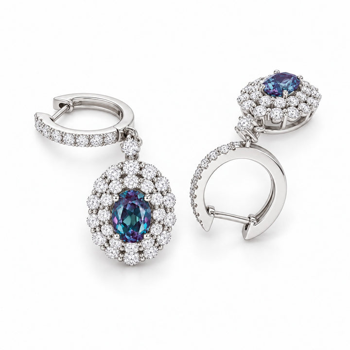 Oval Lab Alexandrite Diamond Halo Drop Earrings in 14K white gold, angled view