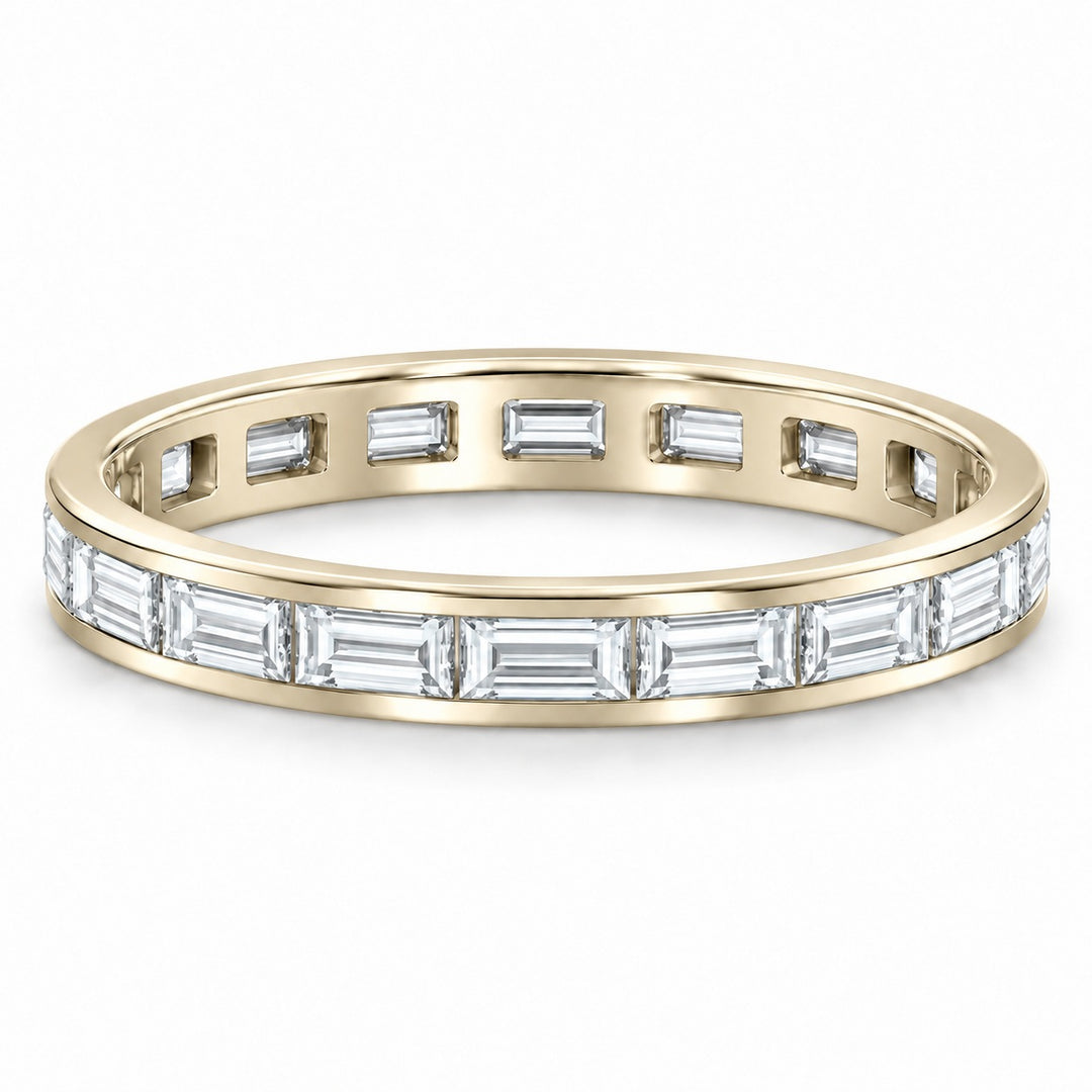 Baguette lab-grown diamond eternity band, 3x1.5mm, 14K yellow gold, angled view