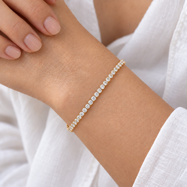Classic Round Lab Diamond Tennis Bracelet in 14K yellow gold, worn on the wrist
