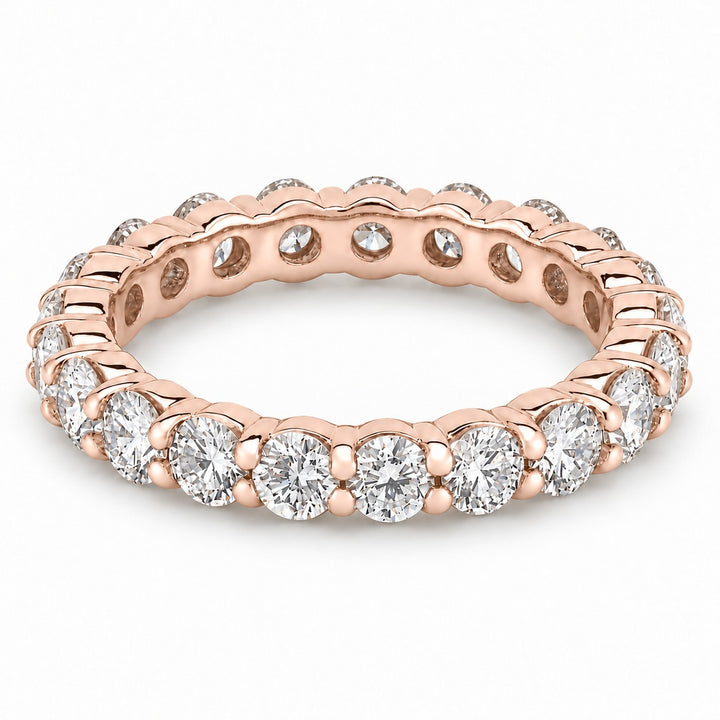 Classic round lab-grown diamond eternity band, 3.0mm, 14K rose gold, angled view