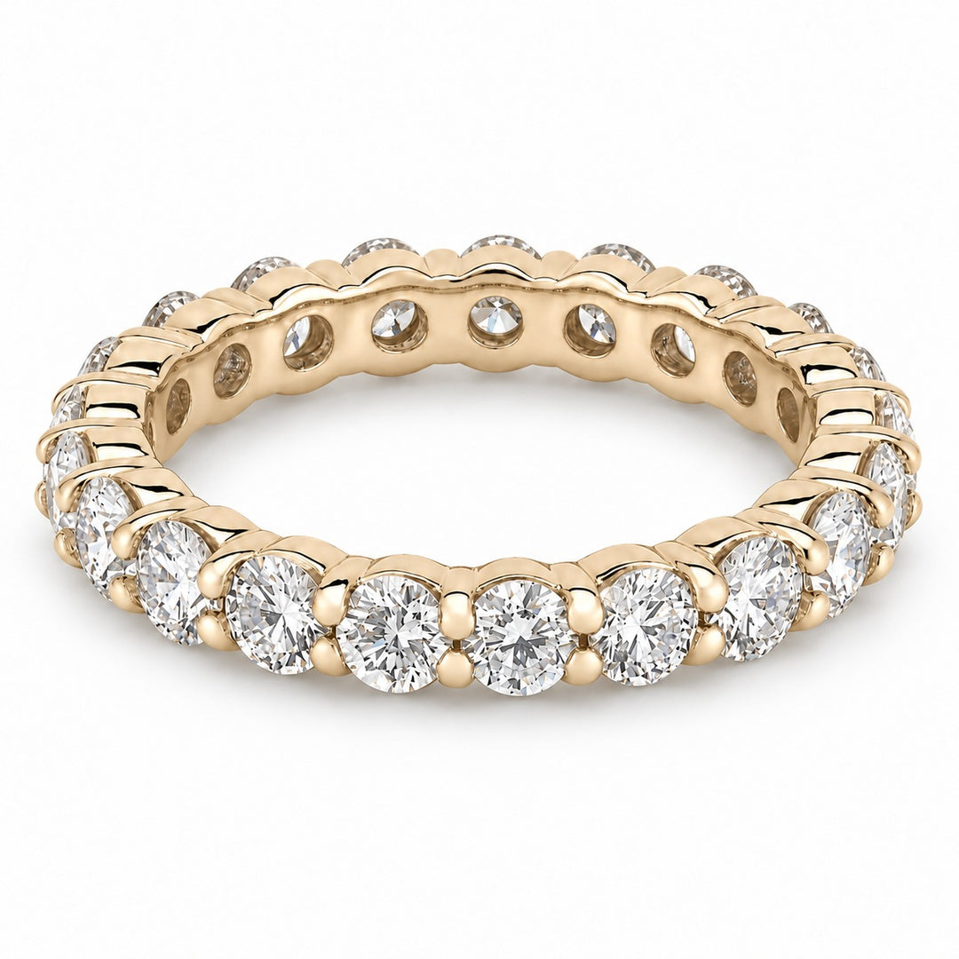 Classic round lab-grown diamond eternity band, 3.0mm, 14K yellow gold, angled view