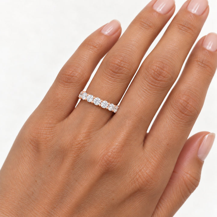 Classic round lab-grown diamond eternity band, 3.5mm, 14K rose gold, on the hand