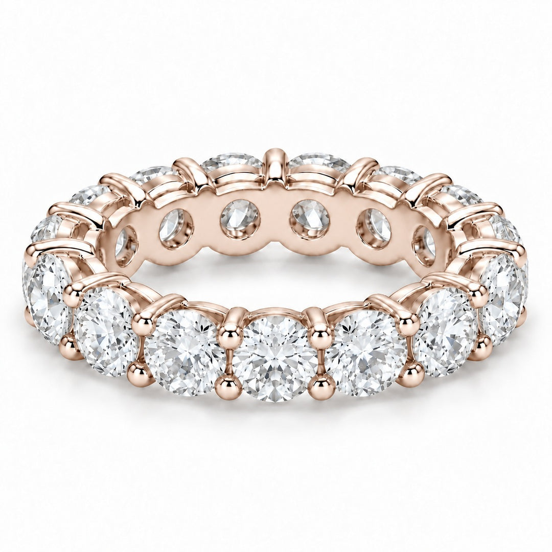 Classic round lab-grown diamond eternity band, 4.5mm, 14K rose gold, angled view