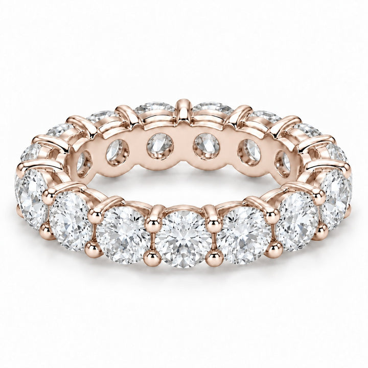 Classic round lab-grown diamond eternity band, 4.5mm, 14K rose gold, angled view