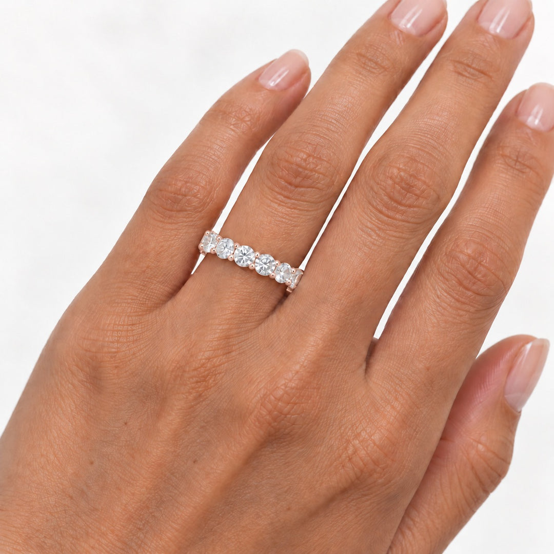 Classic round lab-grown diamond eternity band, 4.5mm, 14K rose gold, on the hand