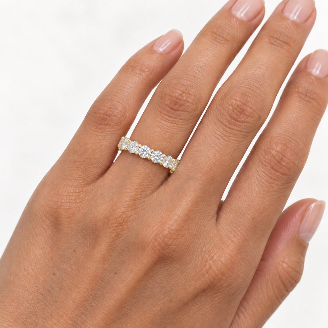 Classic round lab-grown diamond eternity band, 4.5mm, 14K yellow gold, on the hand
