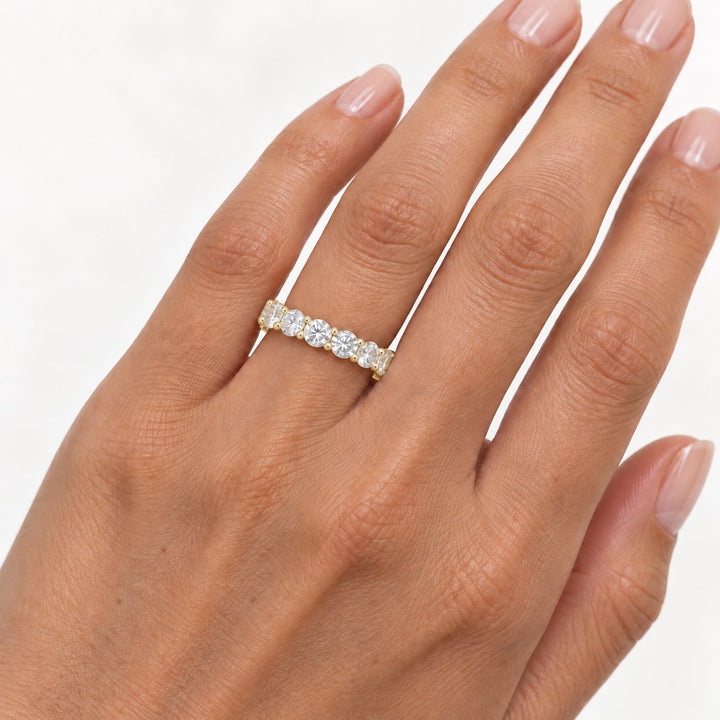 Classic round lab-grown diamond eternity band, 4.5mm, 14K yellow gold, on the hand