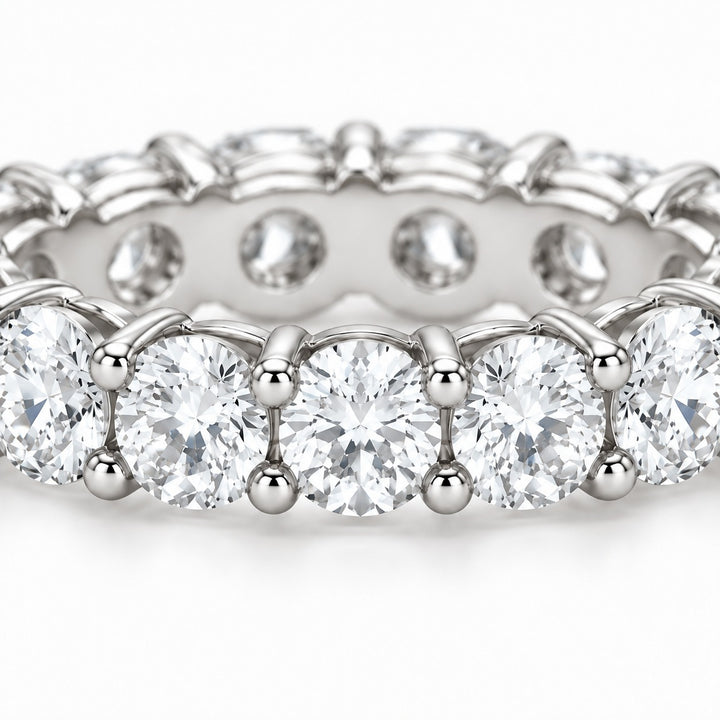 Classic round lab-grown diamond eternity band, 4.5mm, 14K white gold, close-up of the stones
