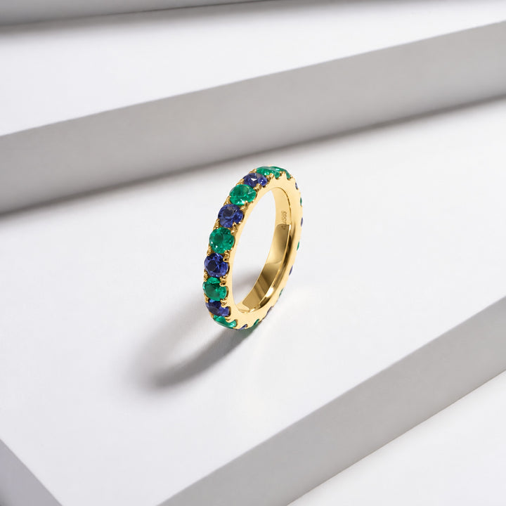 Colombian Emerald & Blue Sapphire Alternating Eternity Band in 14K yellow gold, lifestyle