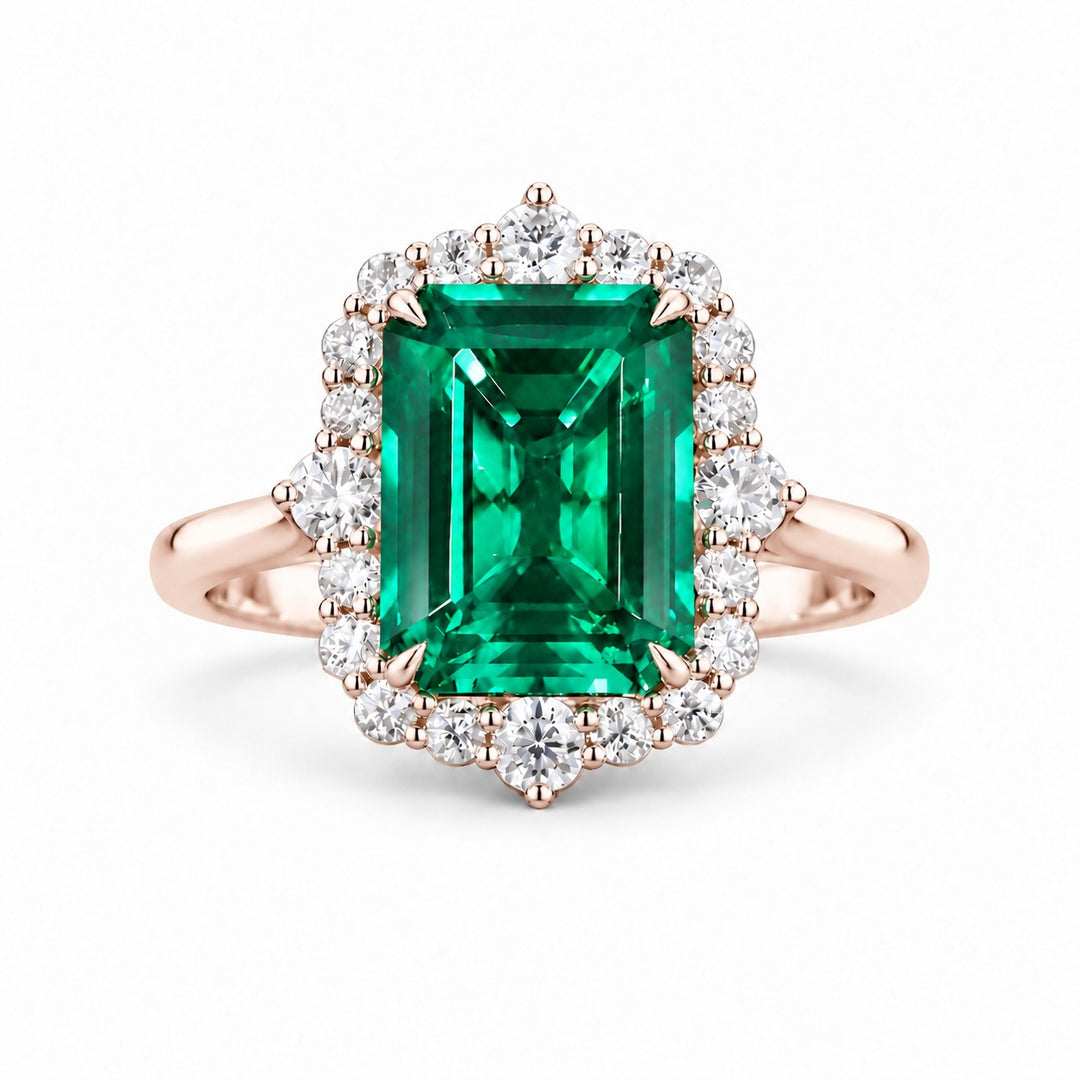 The Crown Halo — Diamond Halo Emerald Ring in 14K rose gold, front view