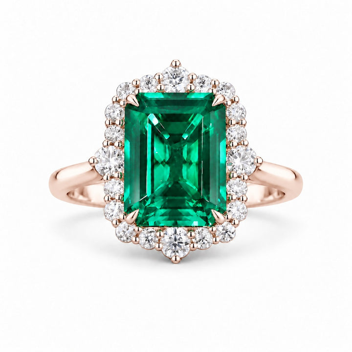 The Crown Halo — Diamond Halo Emerald Ring in 14K rose gold, front view