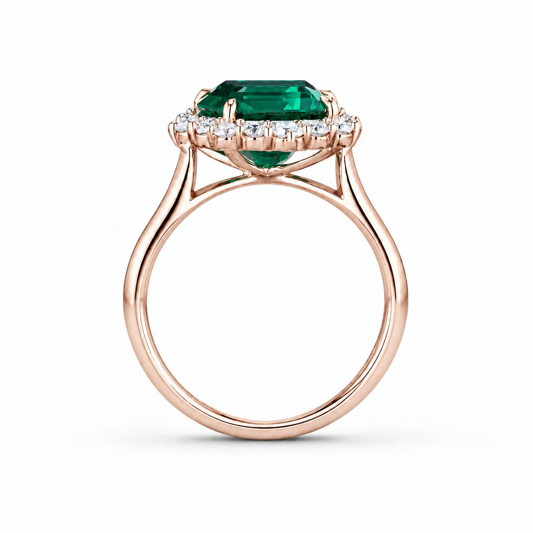 The Crown Halo — Diamond Halo Emerald Ring in 14K rose gold, profile