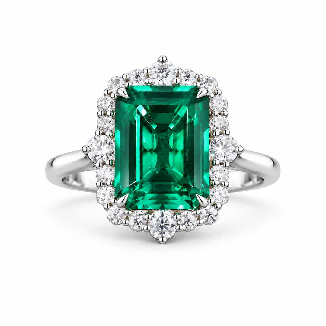 The Crown Halo — Diamond Halo Emerald Ring in 14K white gold, front view