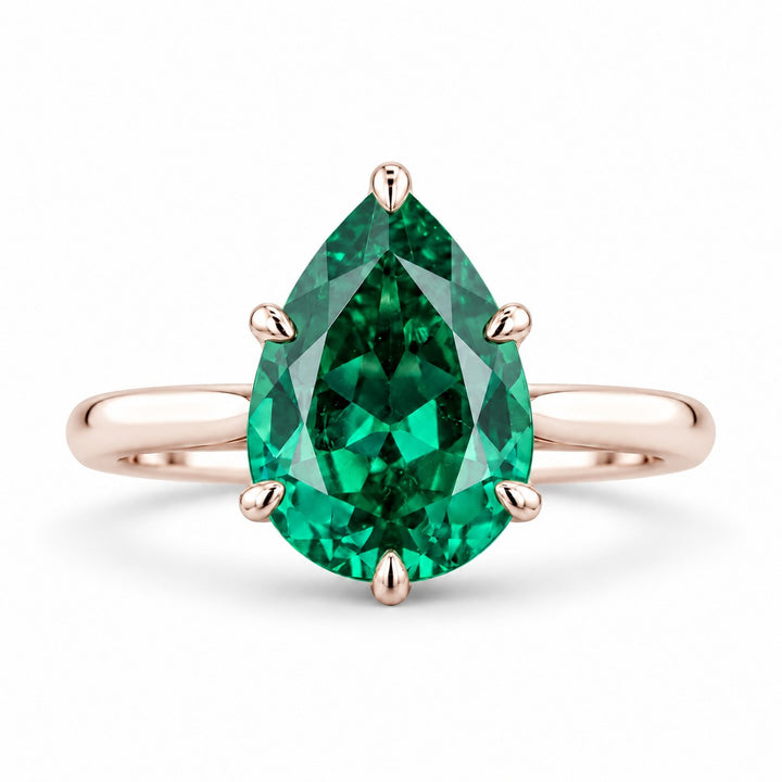 The Lotus Lace — Pear Emerald Ring (Petal Setting) in 14K rose gold, front view