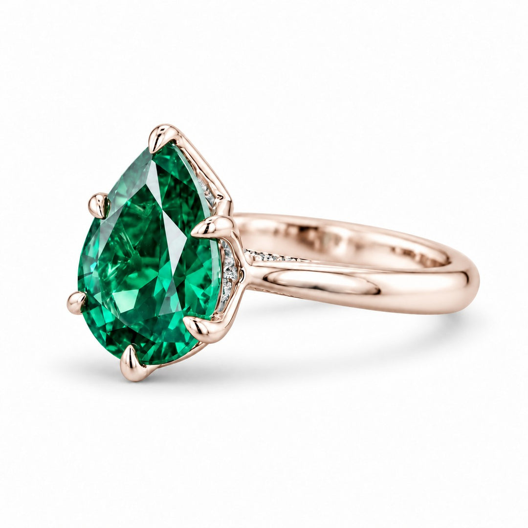 The Lotus Lace — Pear Emerald Ring (Petal Setting) in 14K rose gold, side view