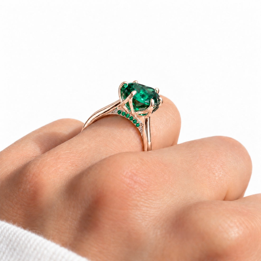 The Lotus Lace — Pear Emerald Ring (Petal Setting) in 14K rose gold, wearing profile