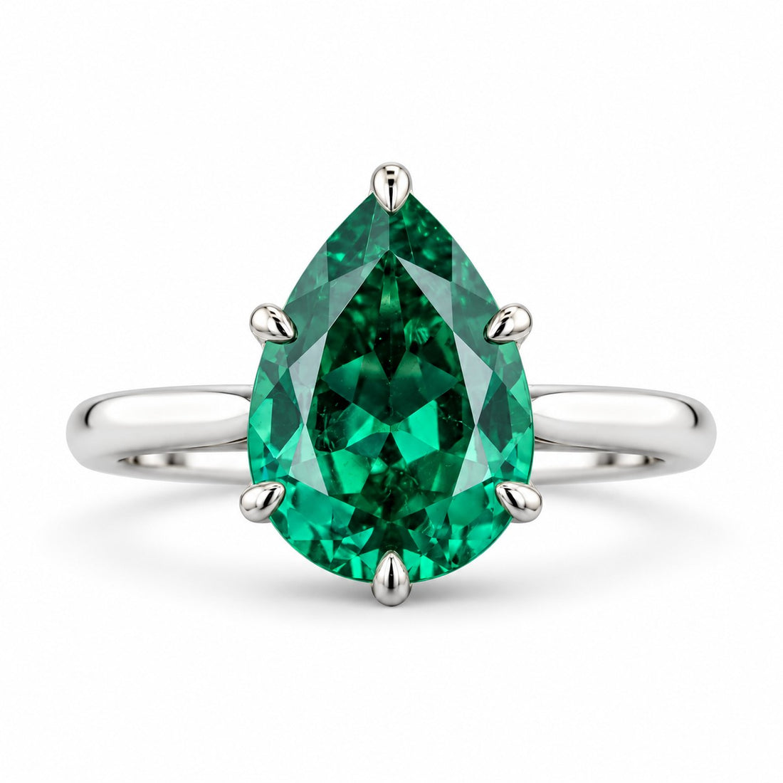 The Lotus Lace — Pear Emerald Ring (Petal Setting) in 14K white gold, front view