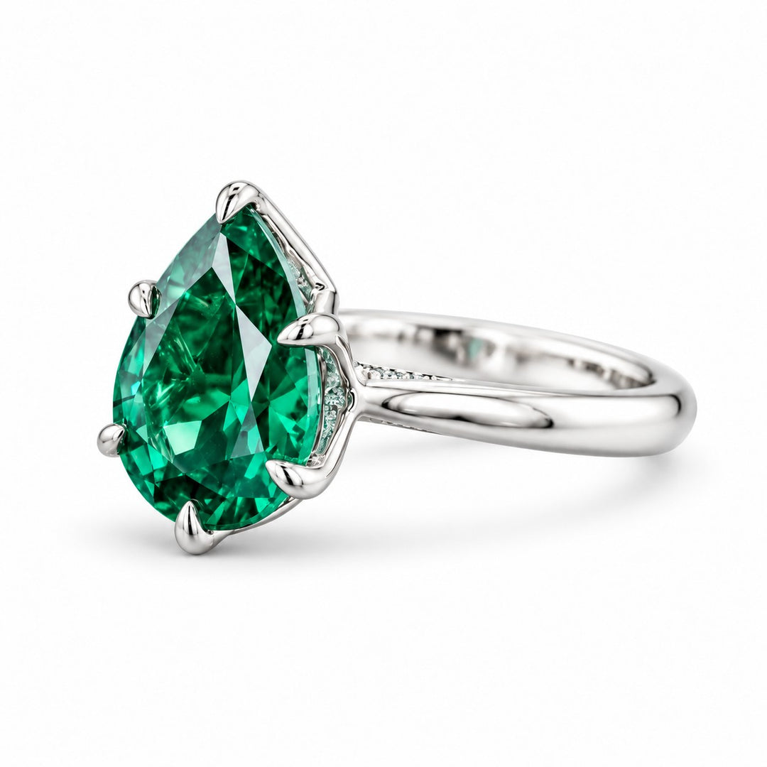 The Lotus Lace — Pear Emerald Ring (Petal Setting) in 14K white gold, side view