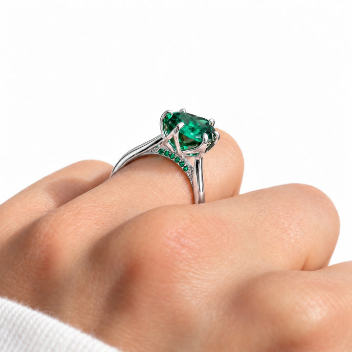 The Lotus Lace — Pear Emerald Ring (Petal Setting) in 14K white gold, wearing profile